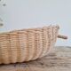 Antique rattan basket - bowl emptier