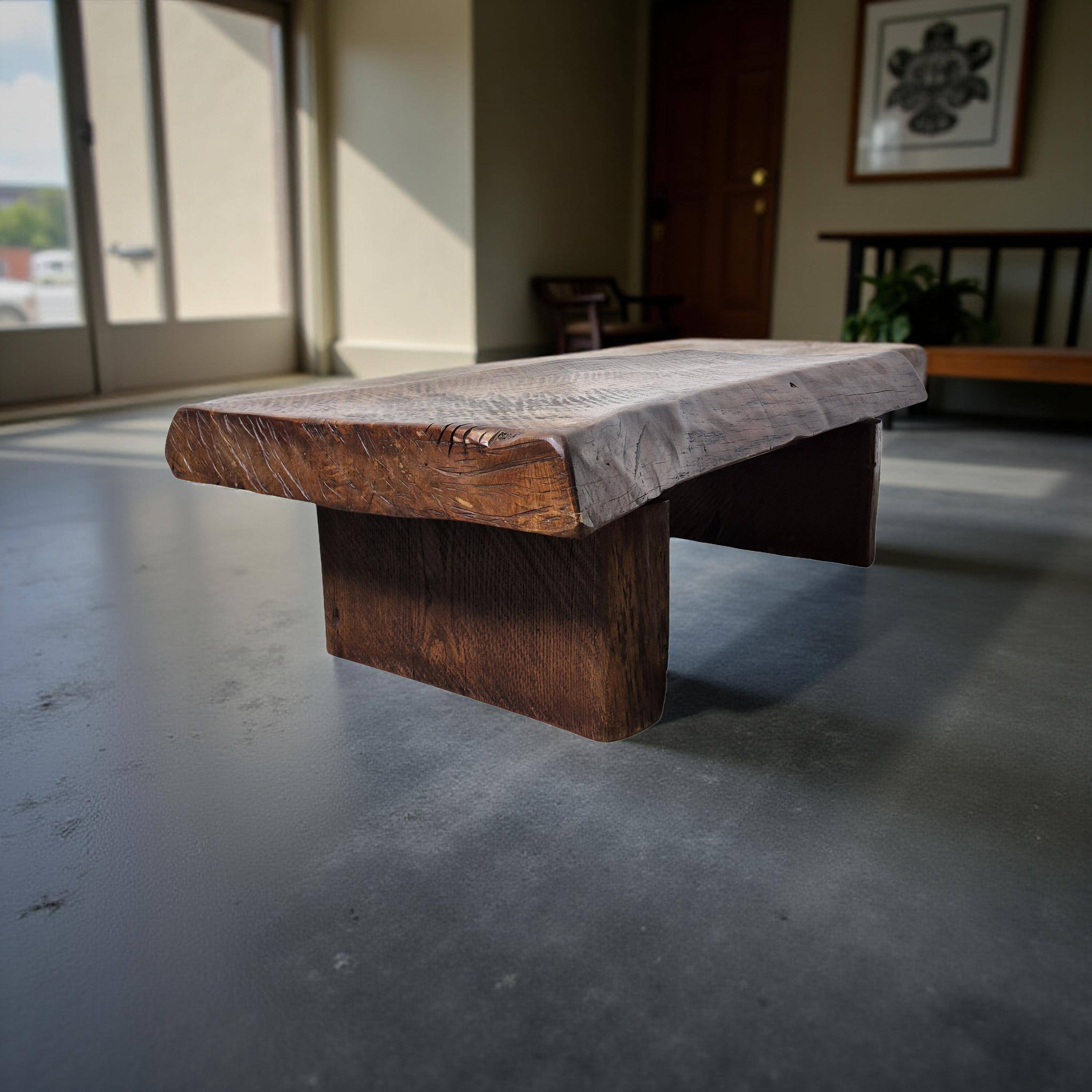Rustic solid oak coffee table with a one piece top, France 1950s