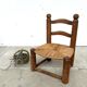 Brutalist chair in wood and straw