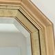 Miroir en bois doré octogonal
