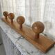 Wooden wall coat rack