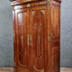 Louis Philippe period wardrobe (nineteenth) entirely covered with gilded bronzes
