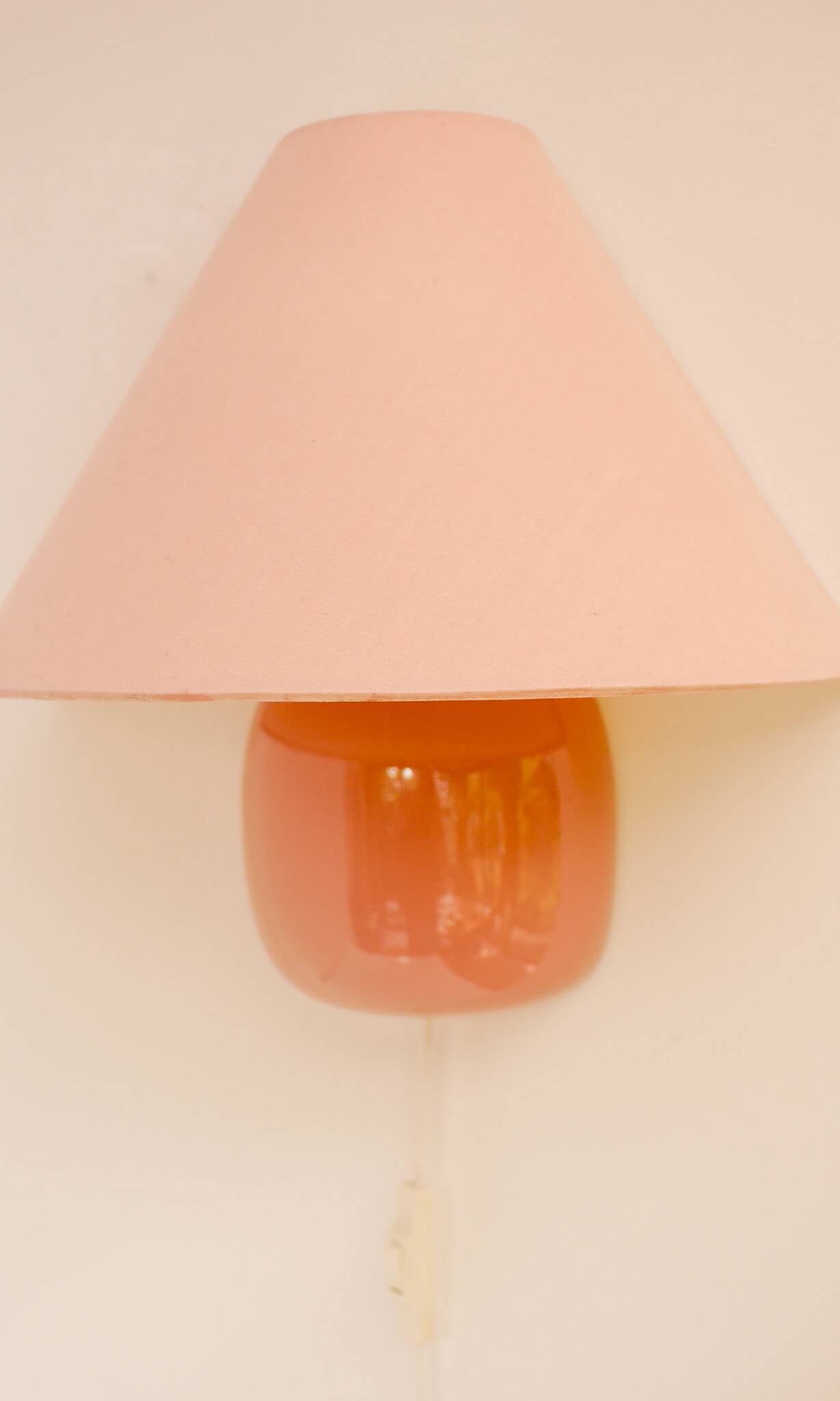 Vintage IKEA 80s sconce. A wall mounted lamp classic semi-round in pink