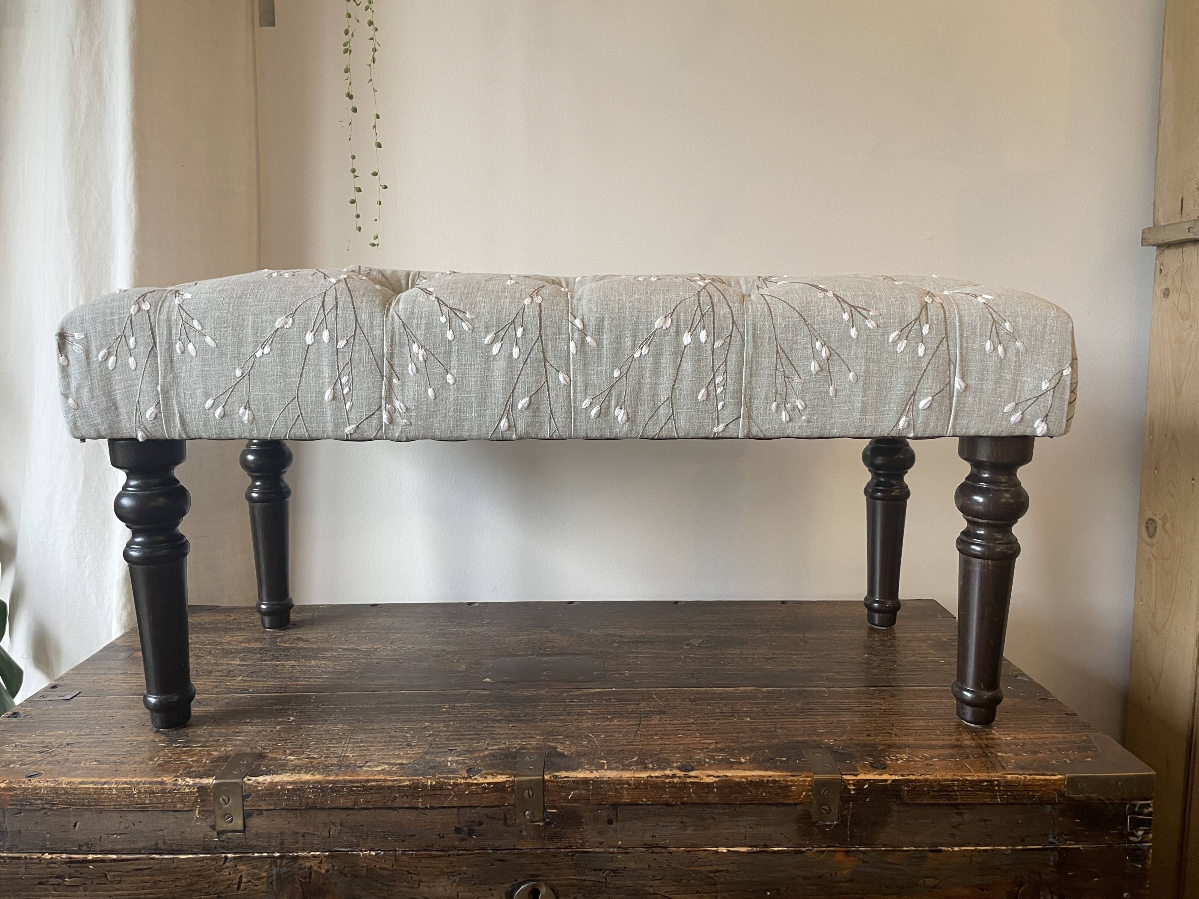 Tufted footrest