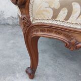 Louis XV shepherdess armchair in carved walnut