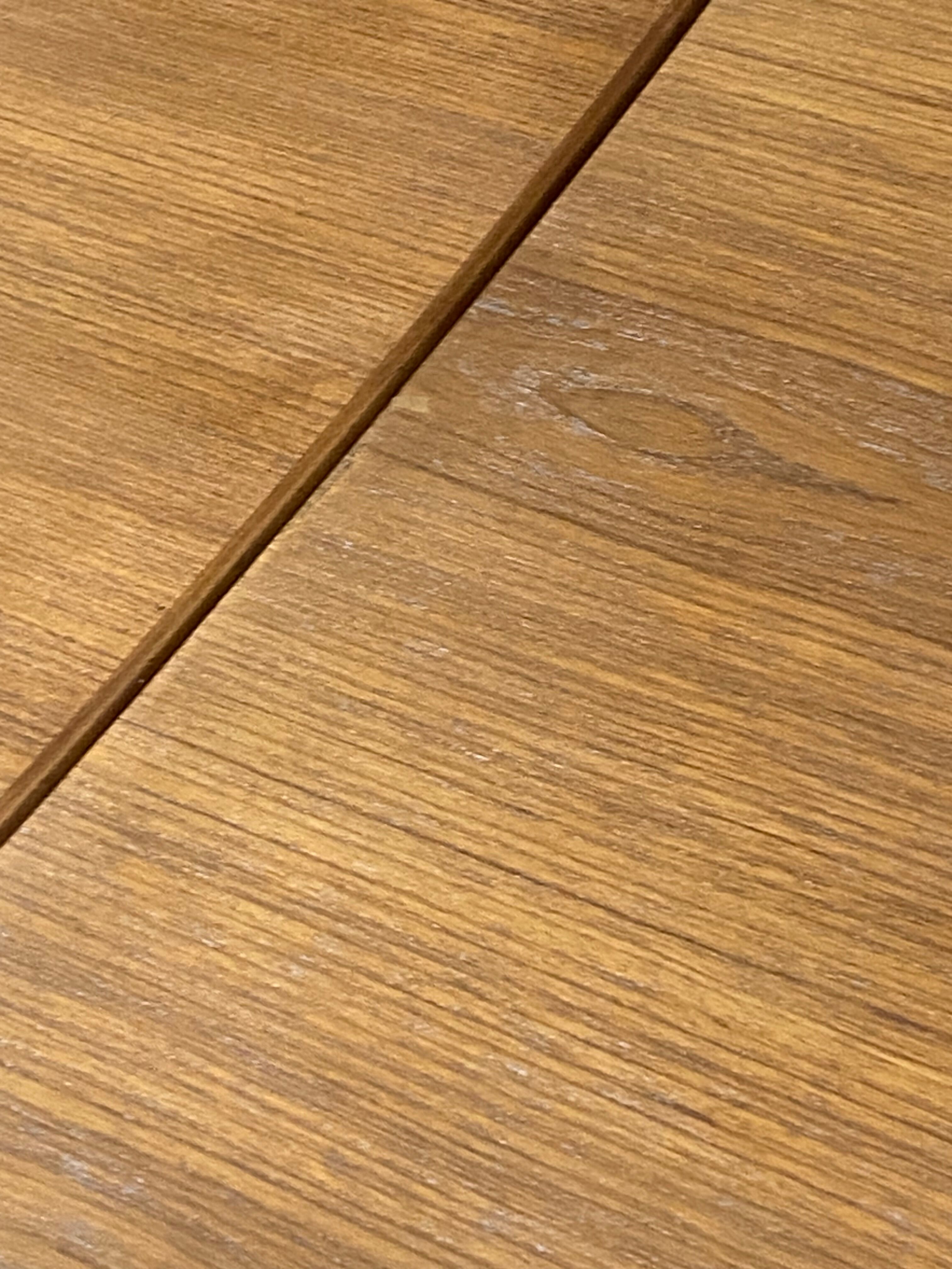 Extendable Scandinavian teak table by Johannes Andersen for Samcom Denmark.