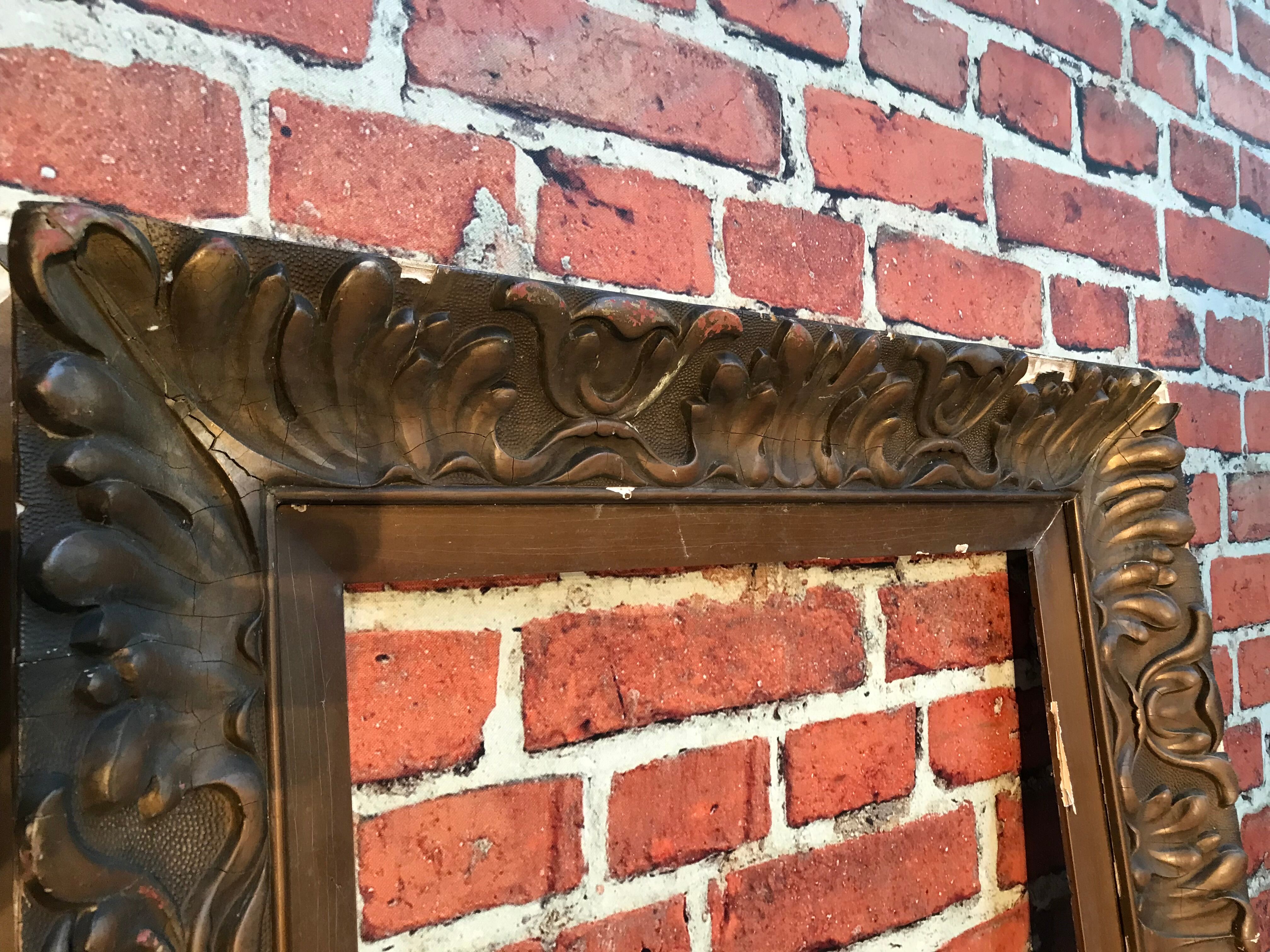 Wooden frame and stucco moldings