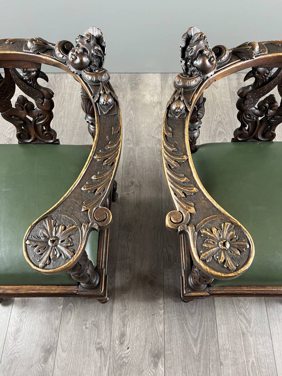 Pair of corner armchairs in carved wood, 19th century