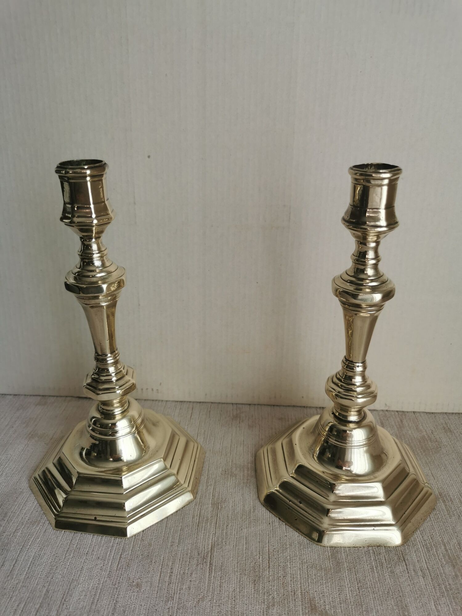 Pair of polished bronze candle holders XVIII th century