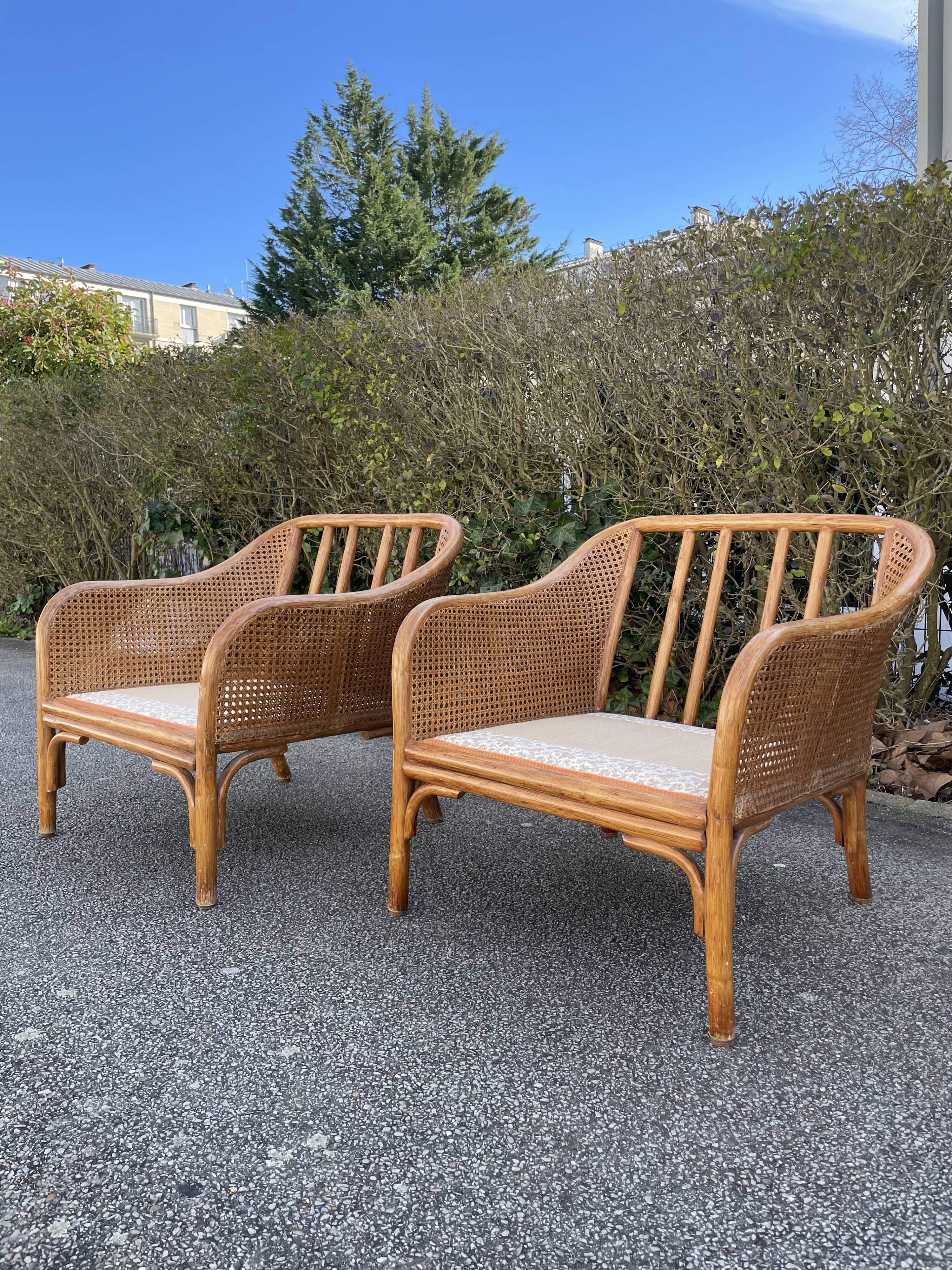 Paire de fauteuils en rotin et cannage