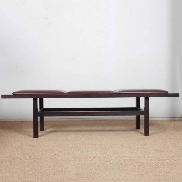 Large black wood and leather bench, 20th century work