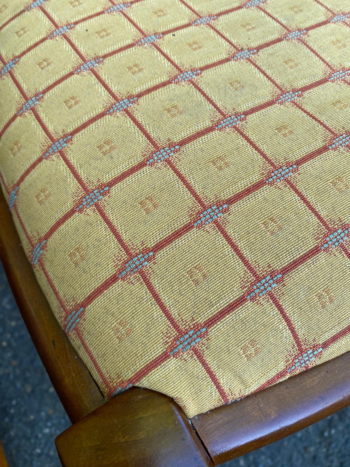 6 Syriel solid cherry wood dining chairs with yellow fabric.