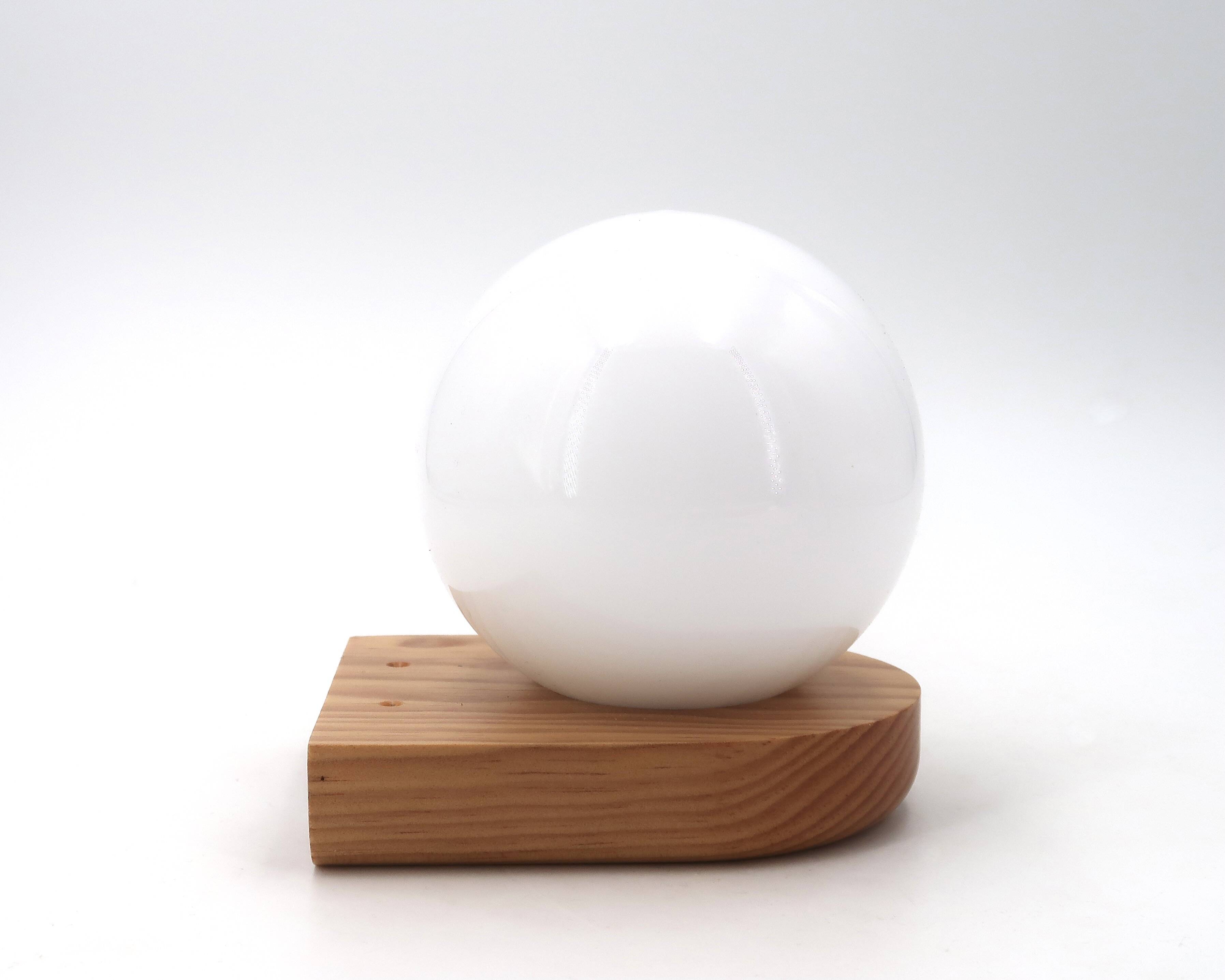 Wall light in pine wood with opaque white glass globe, 1980s