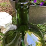 Demijohn in thick glass of the brand viresa. green