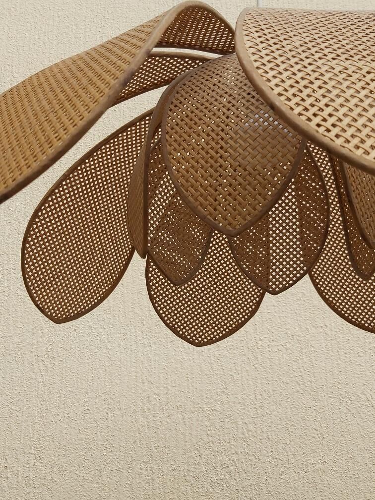 Lotus flower suspension in vintage cannage