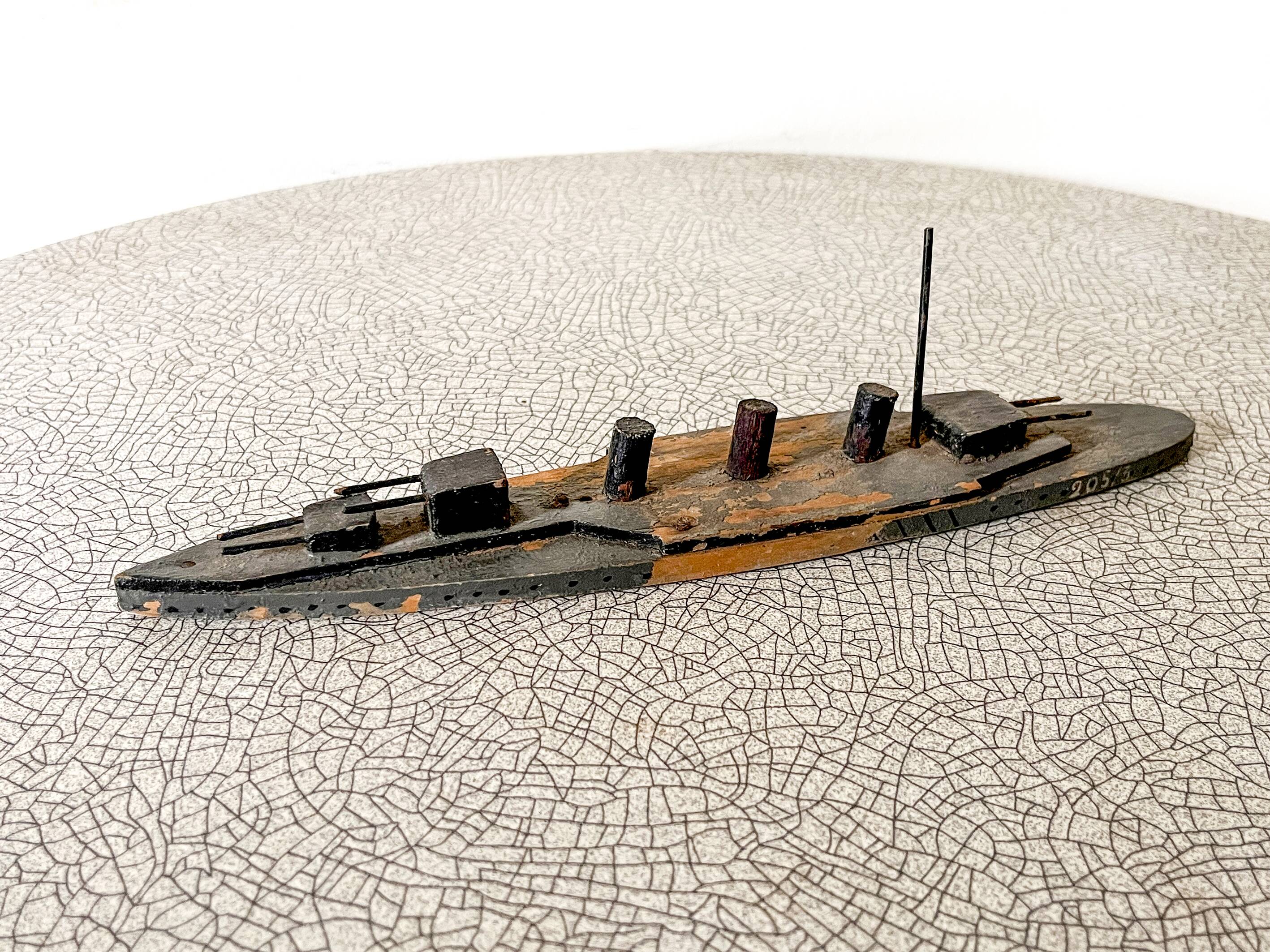 Wooden destroyer boat, antique toy from the early century.