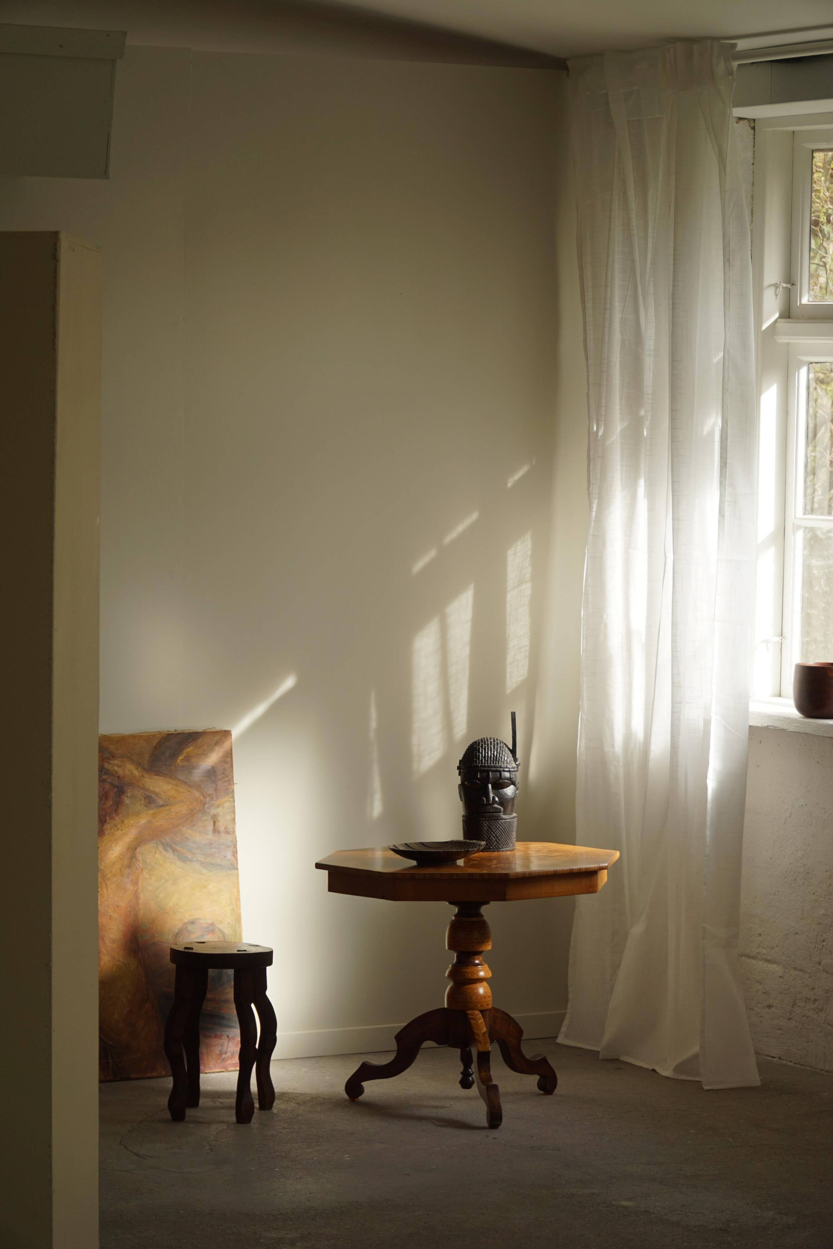 Danish Art Deco octagonal side table in birch with an inlaid top, 1940s.