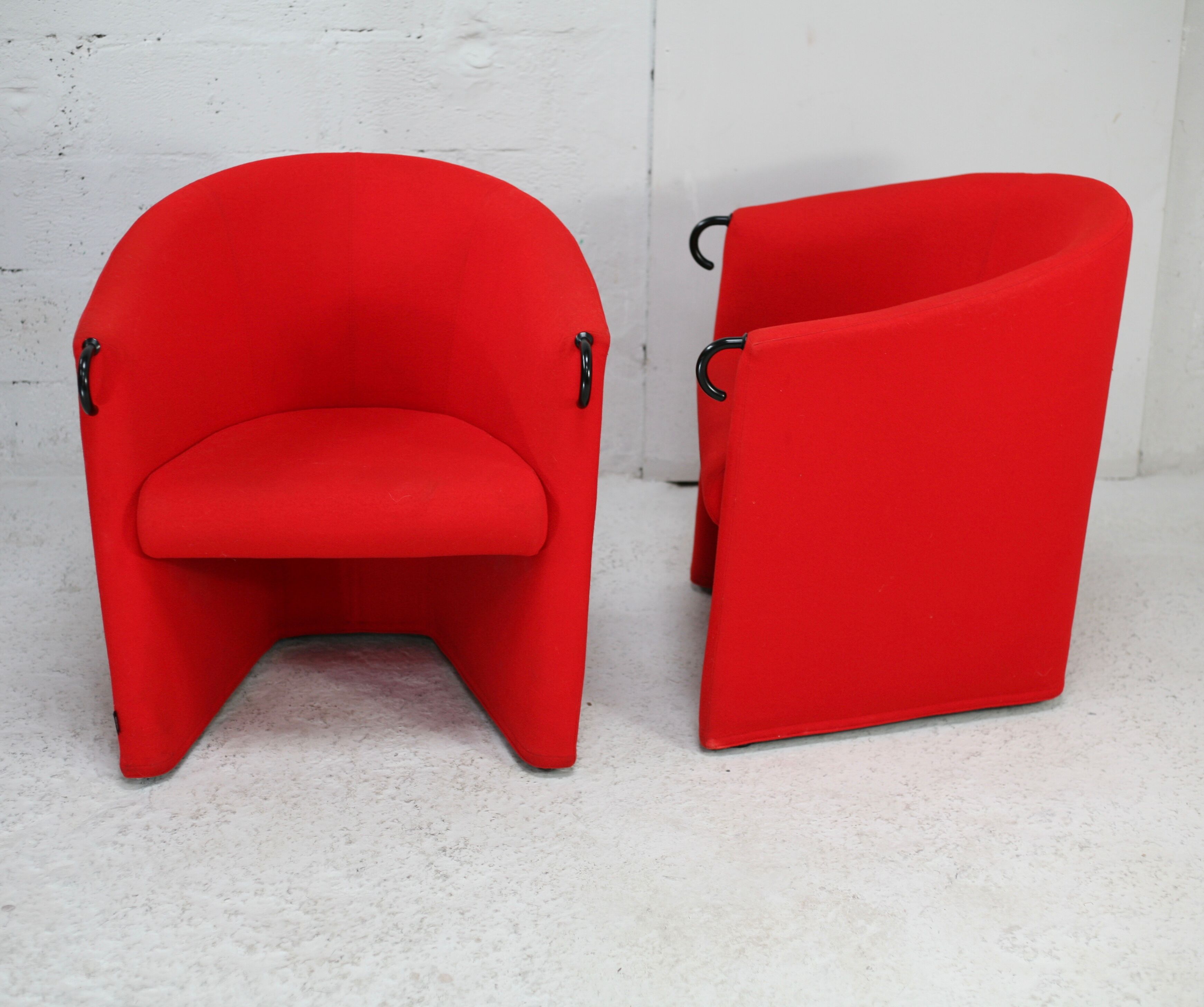 Pair of red Arflex armchairs. Italy, circa 1980