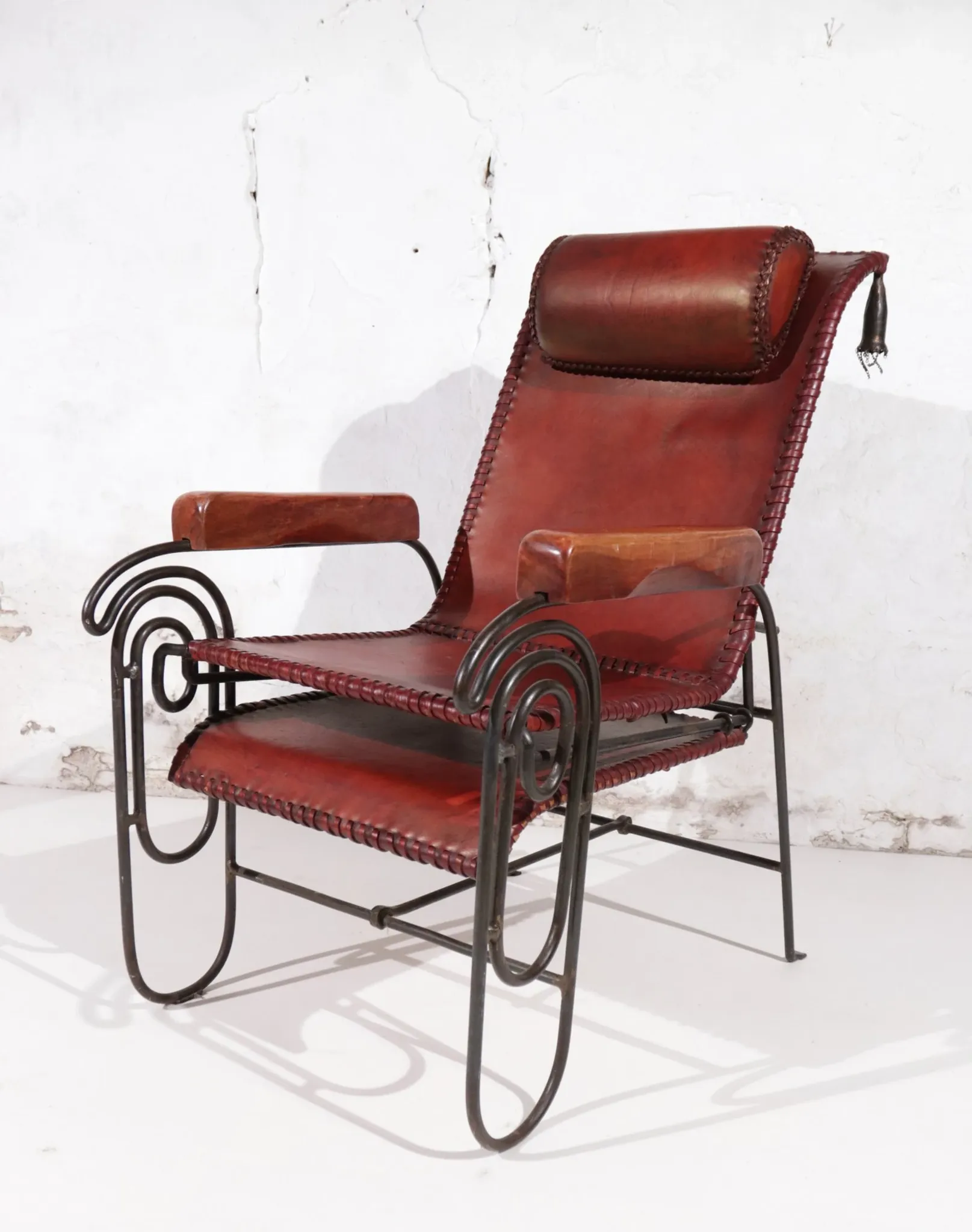French art deco lounge chair in wrought iron and leather with footrest