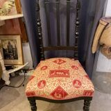 Fireplace or changing chair period 1900 in black lacquered wood and printed fabric