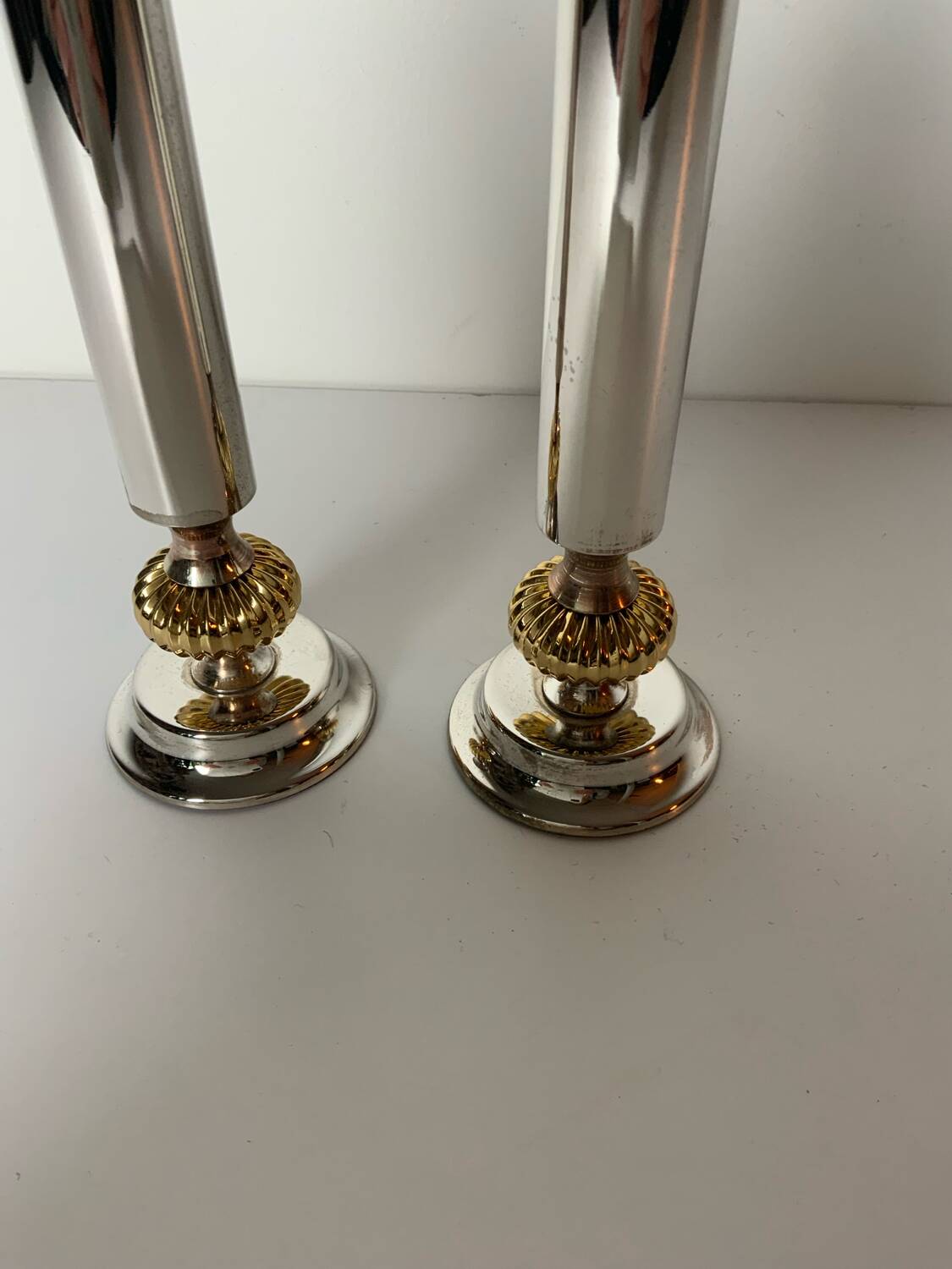 Pair of metal candlesticks