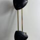 Wall-mounted coat rack with 3 hooks from the 1960s.