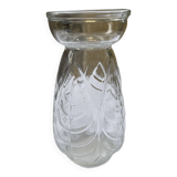 Small glass vase with leaf pattern.