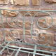 Former child bed in wrought iron