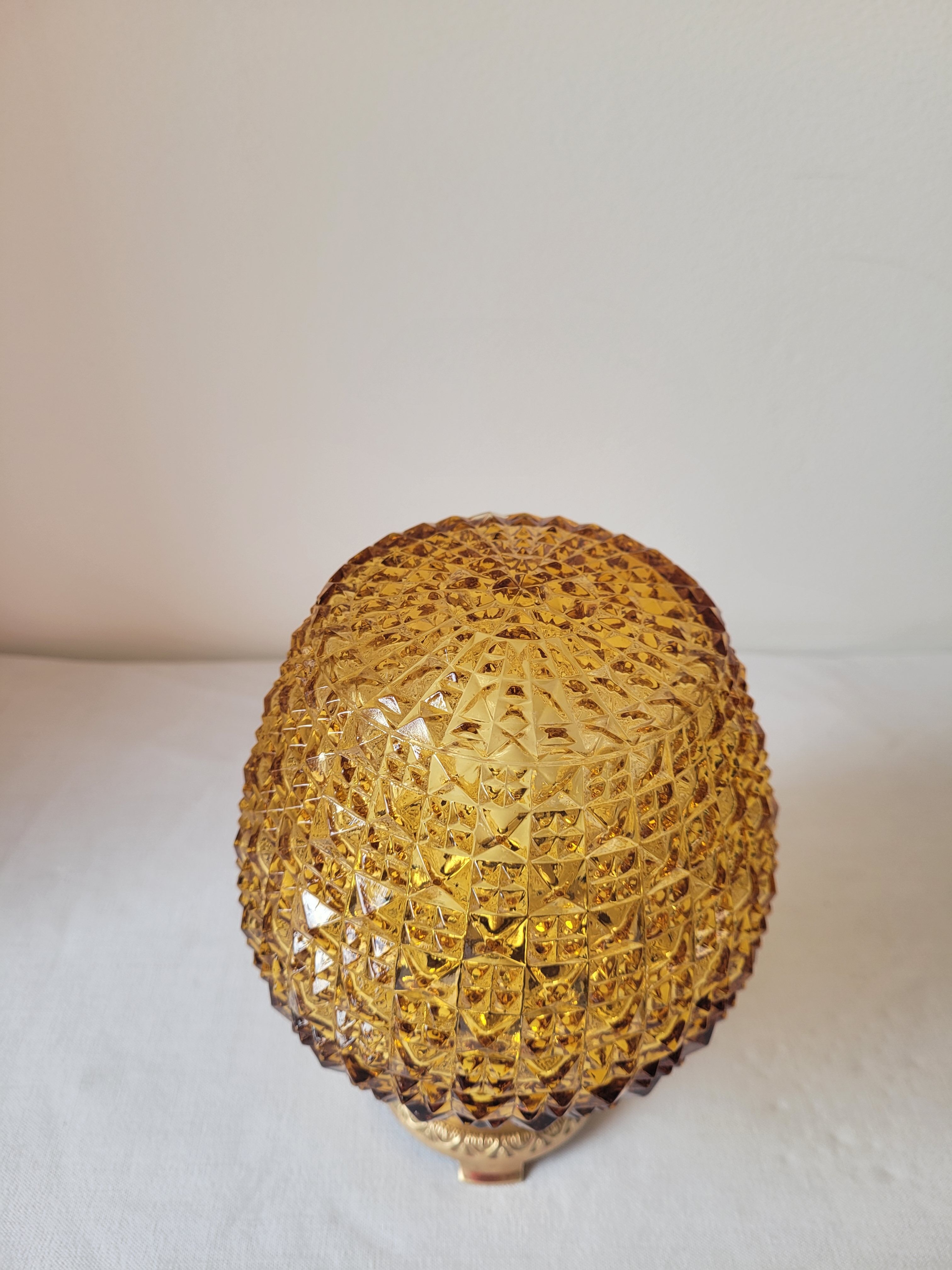 Bedside lamp in amber glass and brass