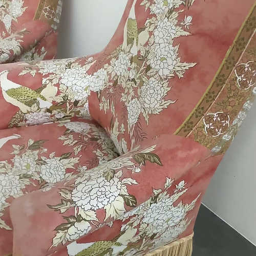 Exquisite pair of upholstered slipper lounge chairs depicting pheasants and peonies