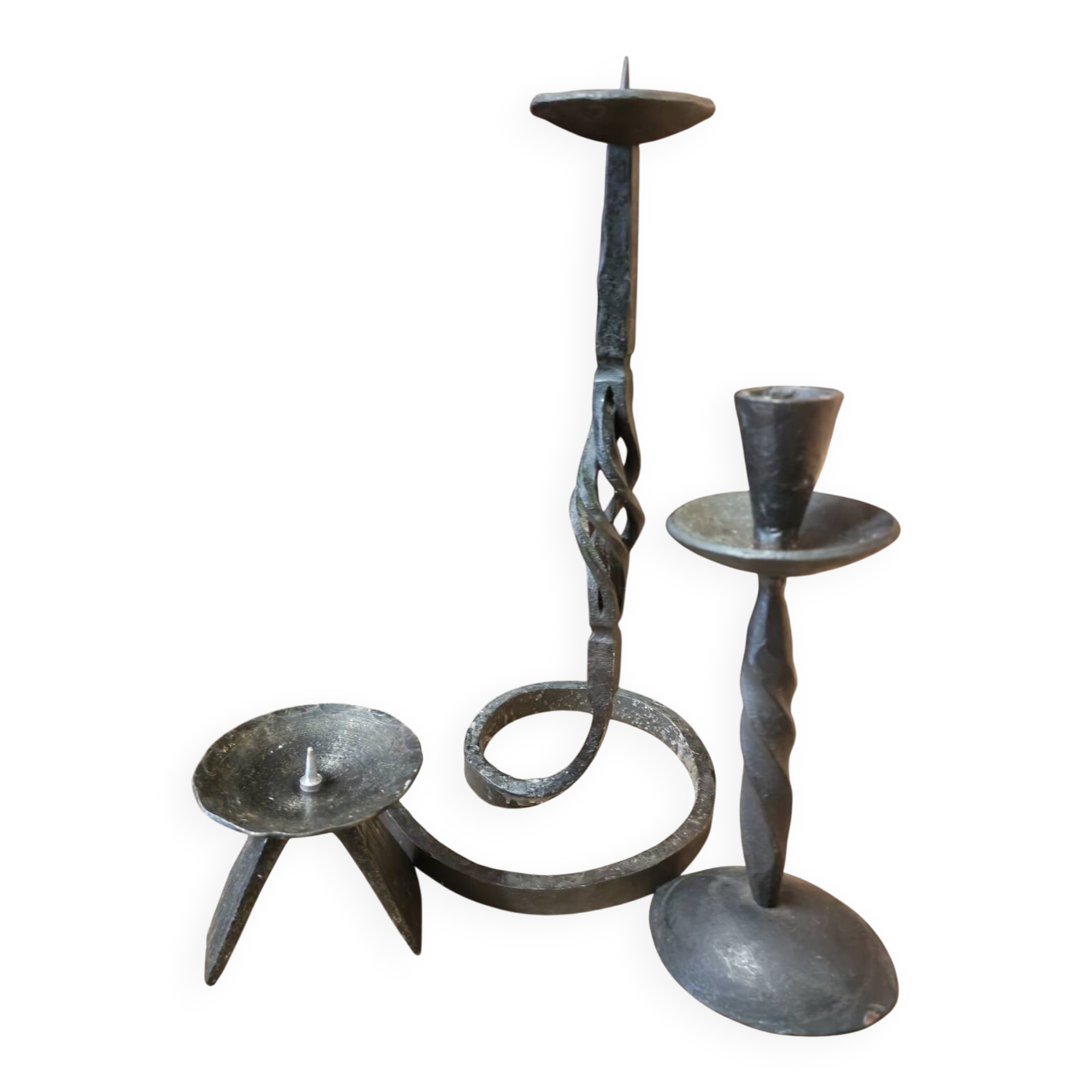 Set of 3 candlesticks and a candle holder in wrought iron.