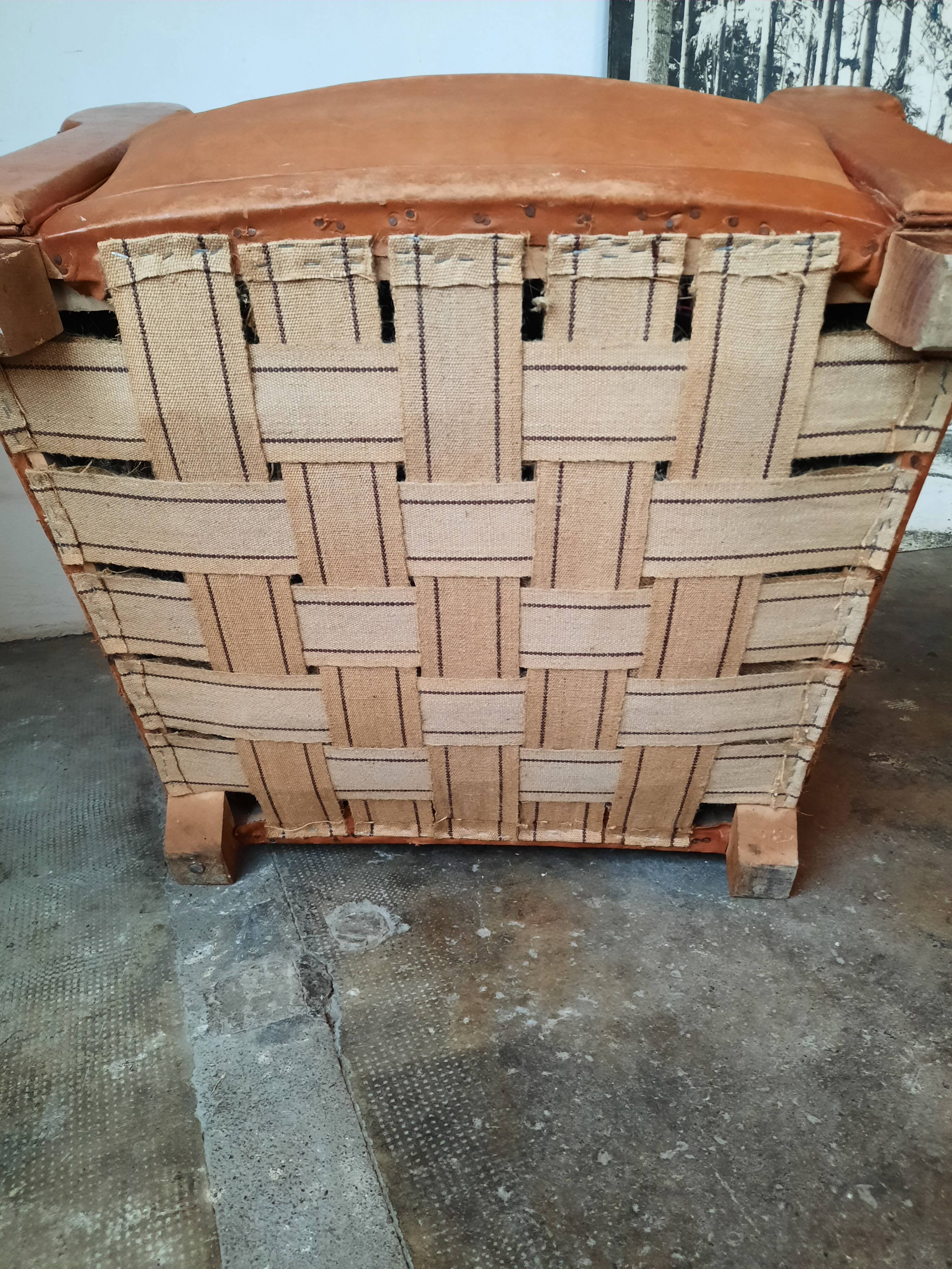 Old leather club chair 1940-1950