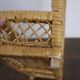 Rattan wall shelf