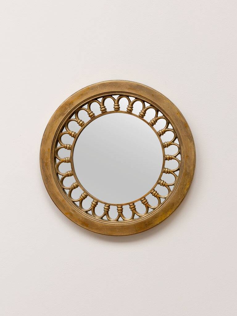 Round golden mirror