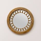 Round golden mirror
