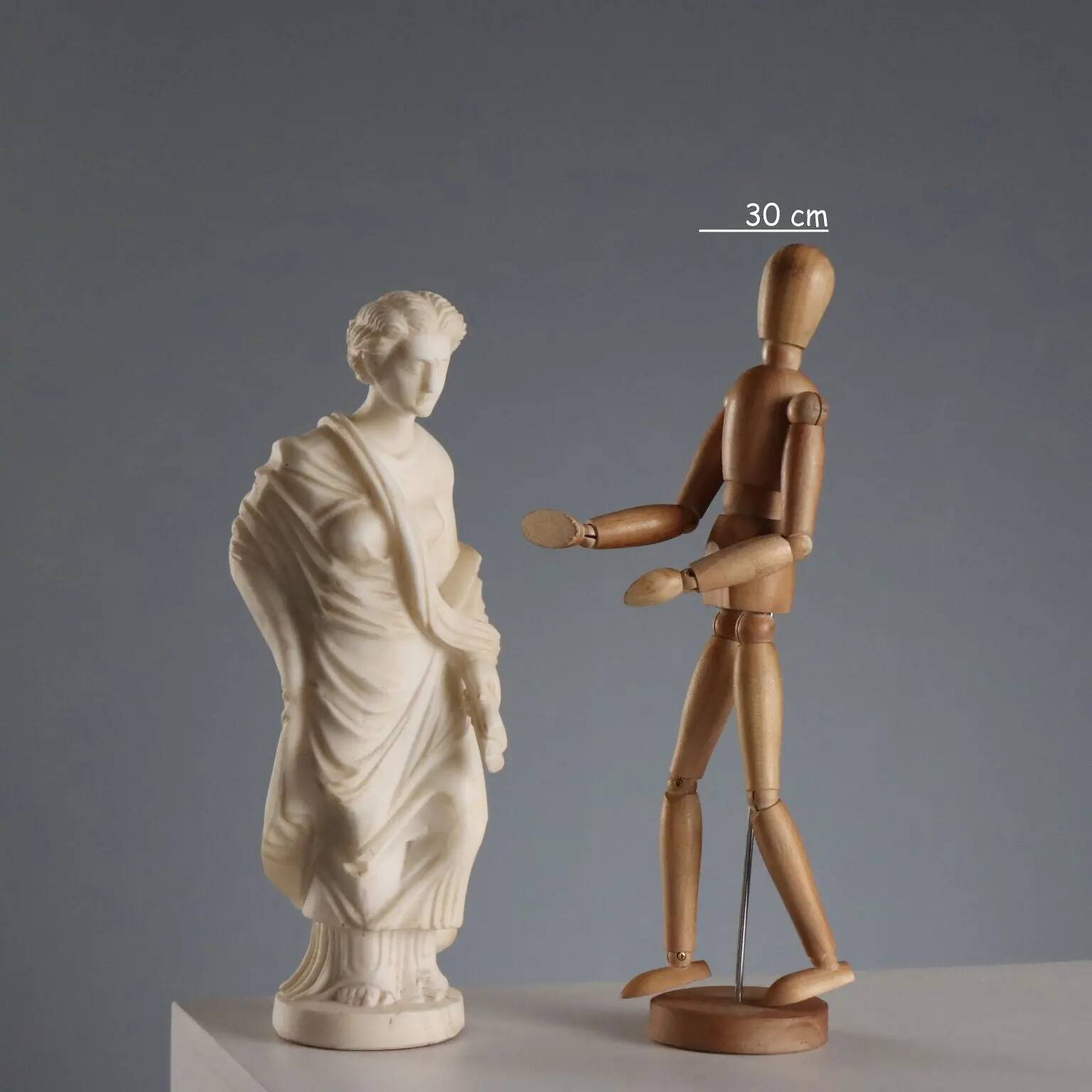 Sculpture of a Roman matron in white marble, Italy, 19th century.