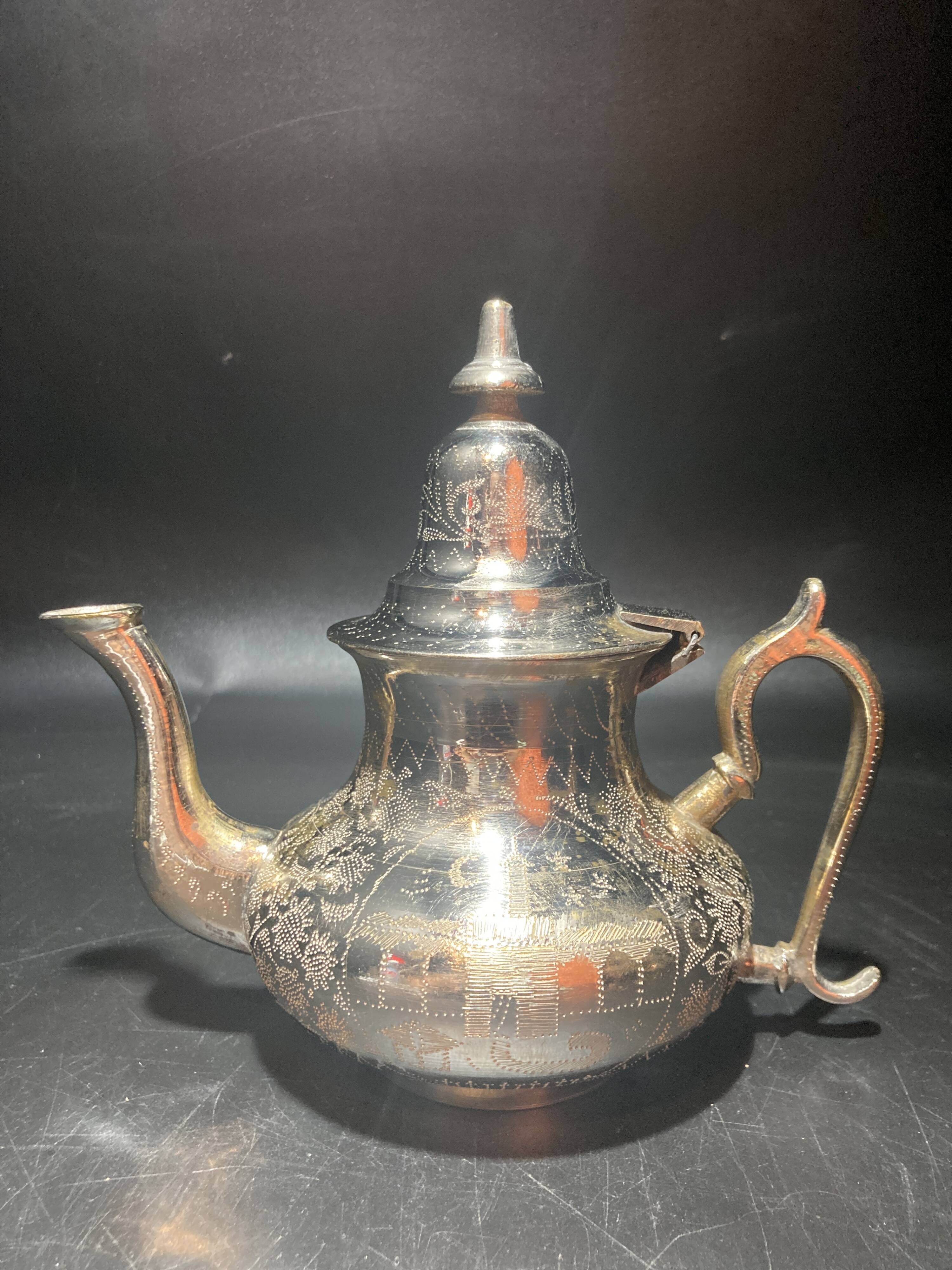 Silver metal teapot