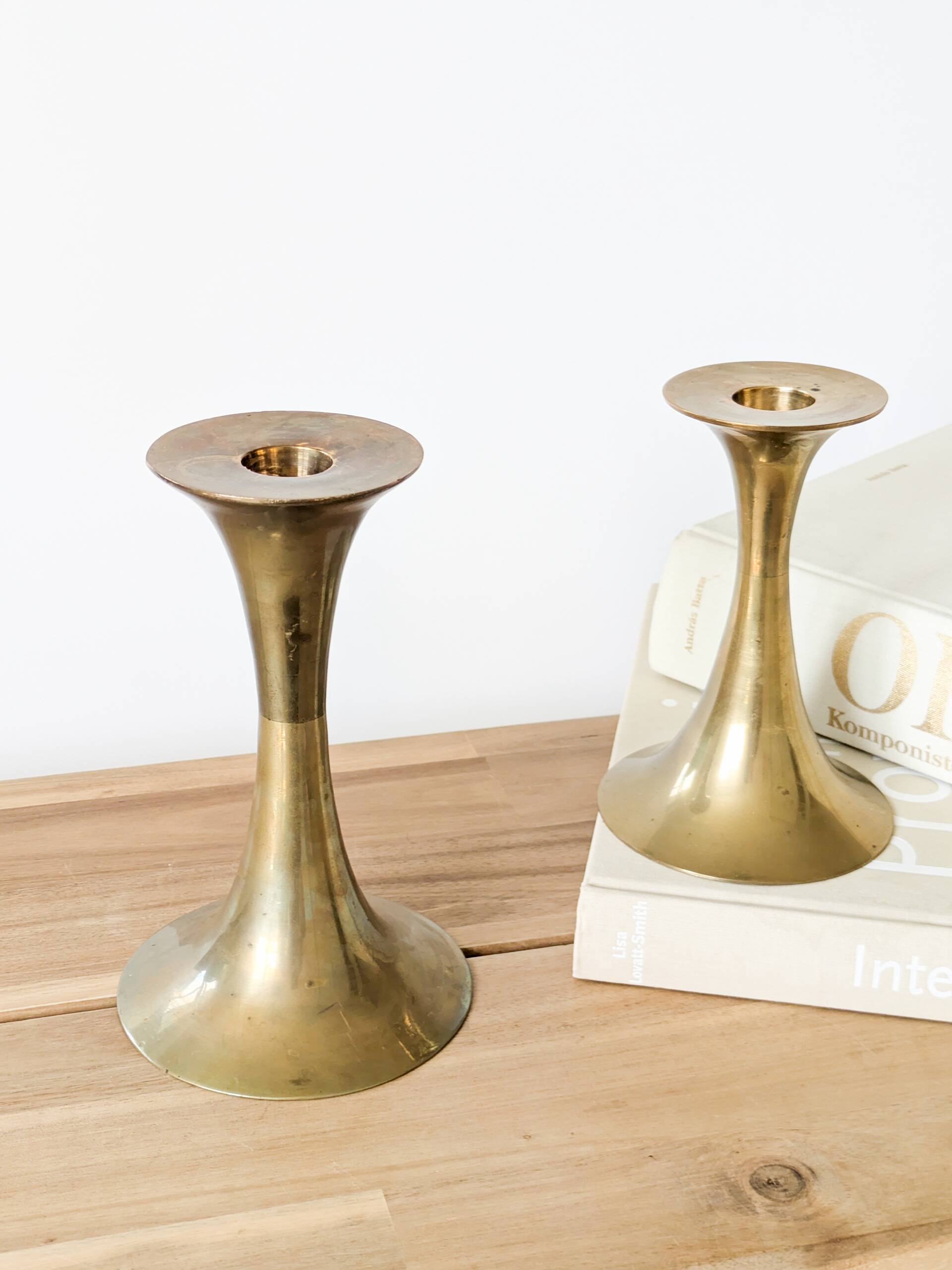 Pair of Midcentury brass candlesticks, flared shape.