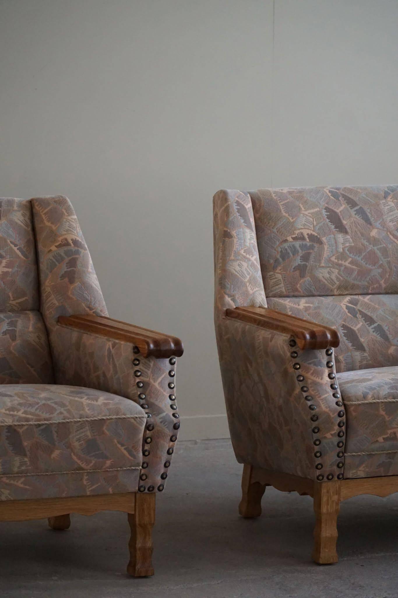 Mid-century modern Danish, pair of oak armchairs with original fabric, 1960s.