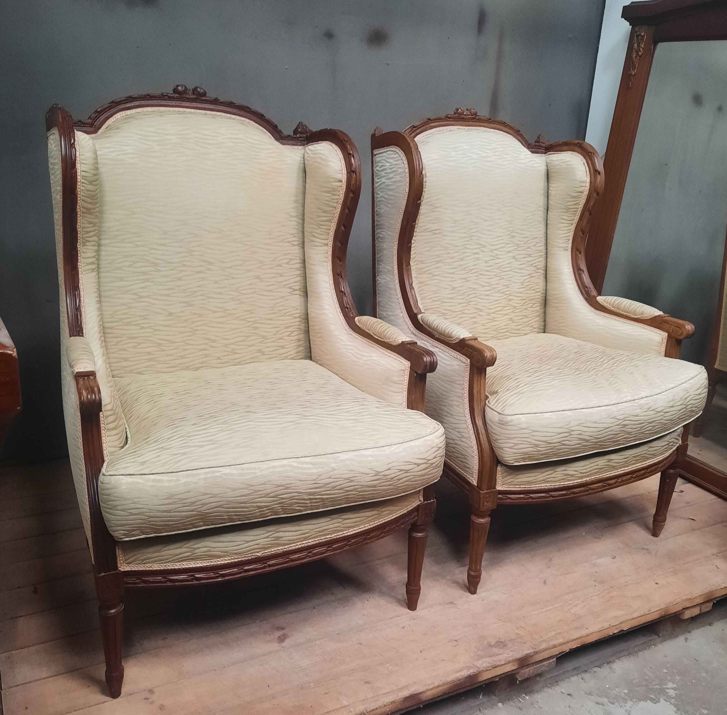 Pair of wingback armchairs in Louis XVI style