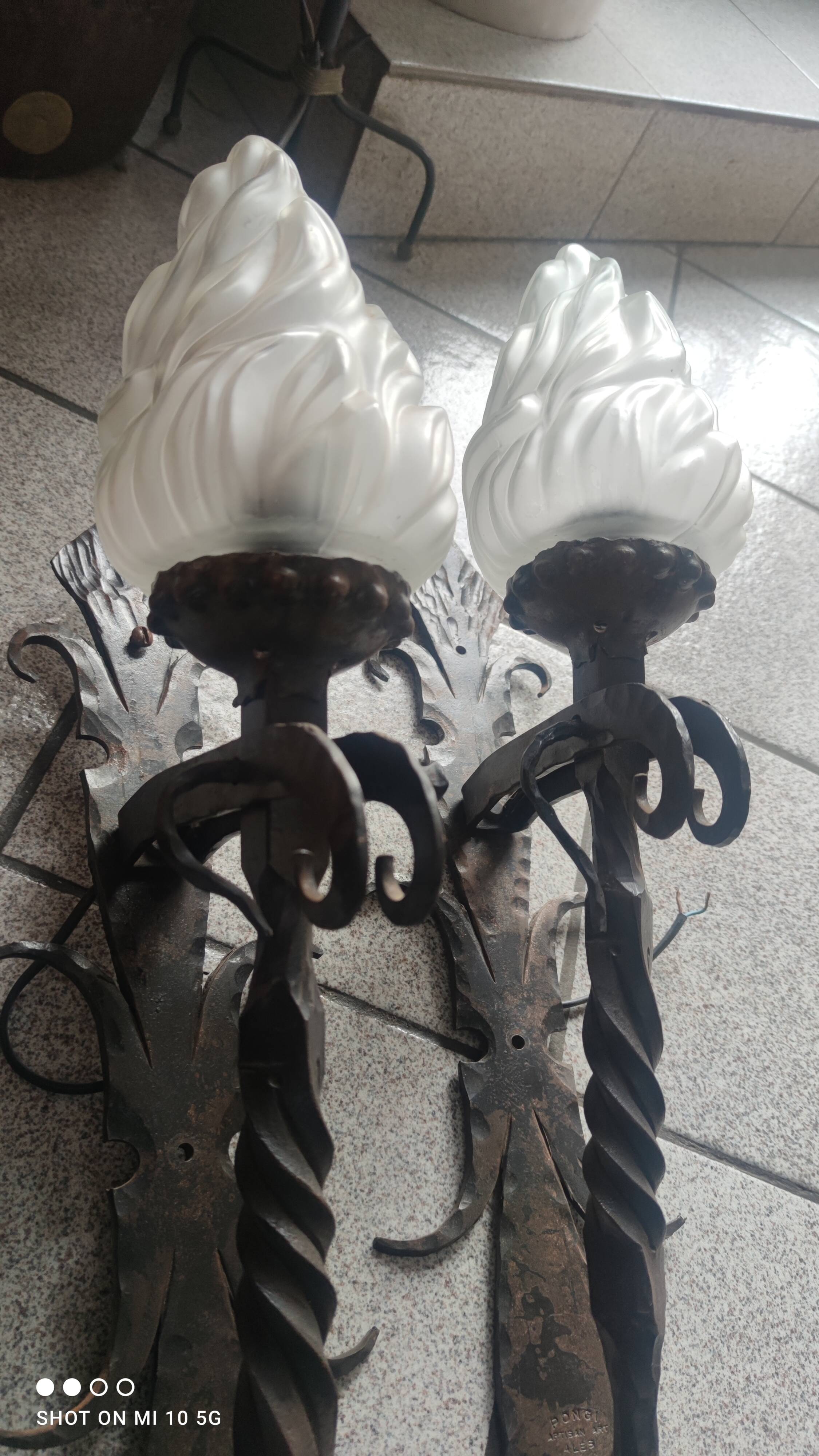 Pair of steel and glass torchieres circa 1950