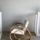 Large rattan rest chair and white cushions