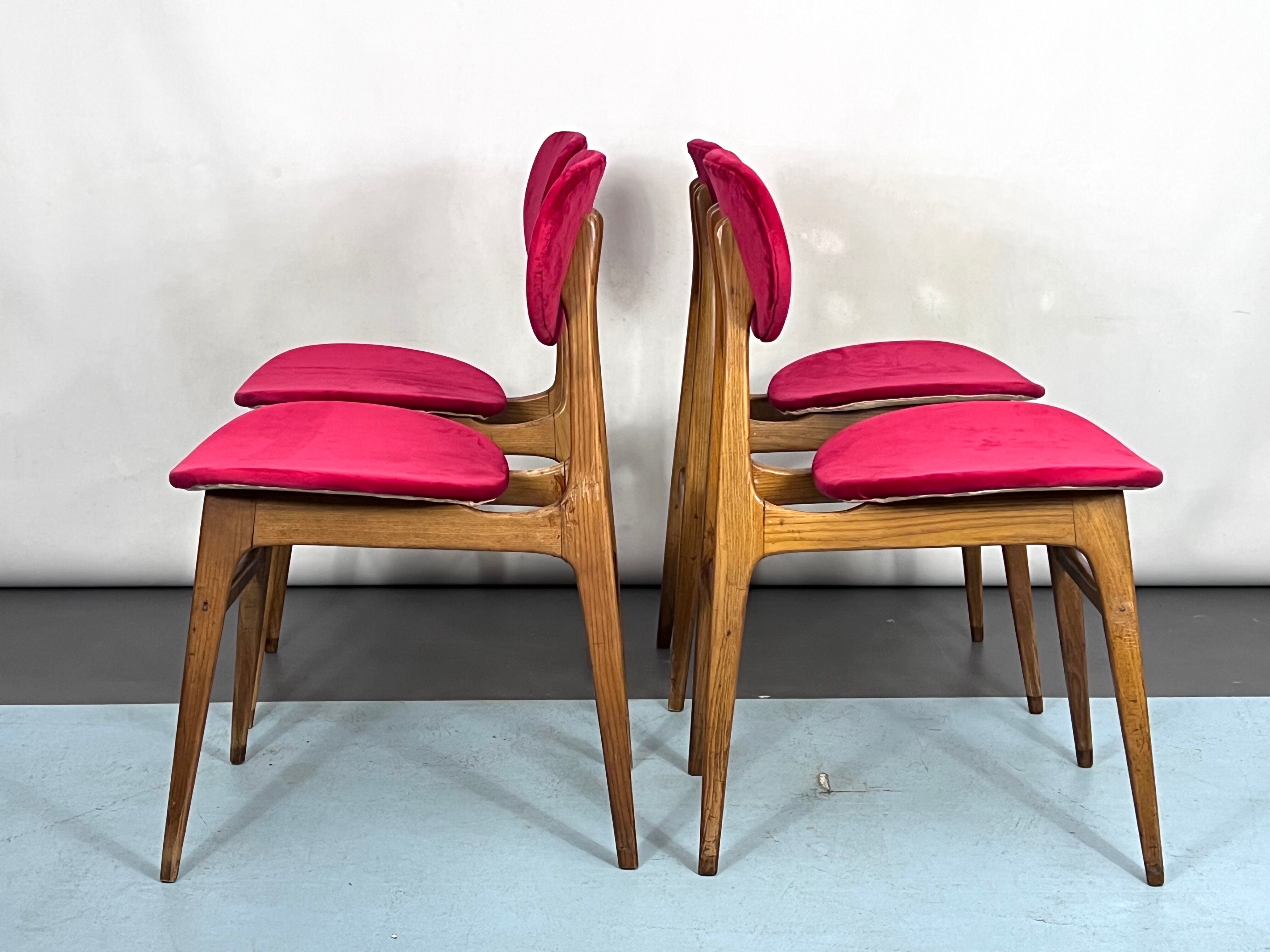Set of four red velvet and wood dining chairs, Italy 1950