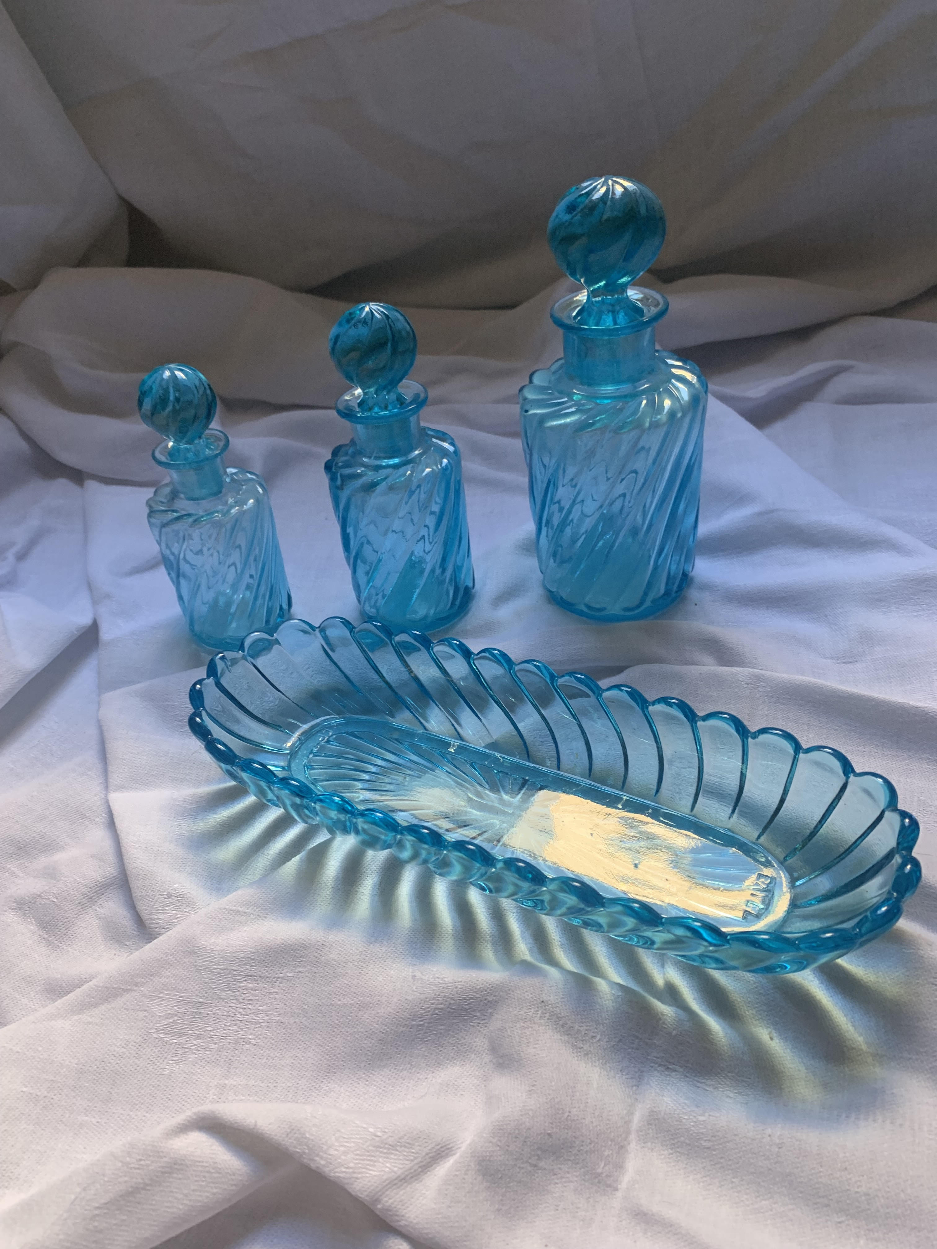 Toiletries and vintage blue glass bottles
