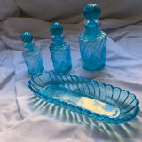 Toiletries and vintage blue glass bottles