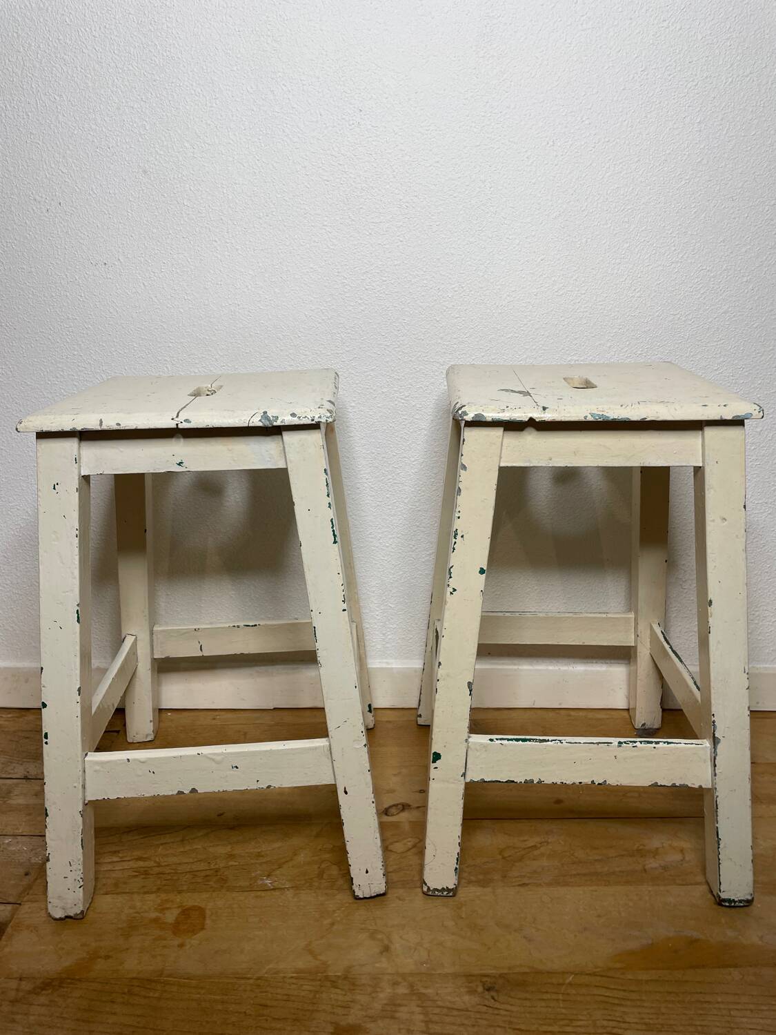Pair of vintage cream stools in painted wood