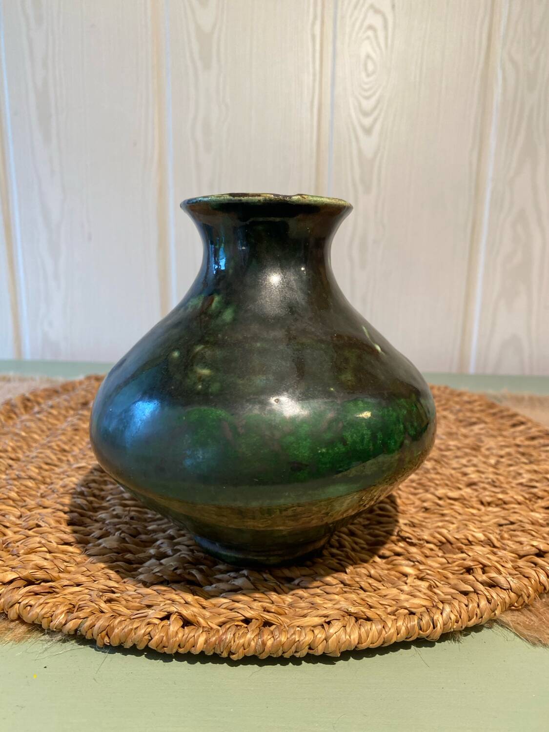 Small green glazed terracotta vase