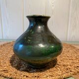 Small green glazed terracotta vase