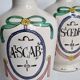Pair of antique apothecary pots in glazed ceramic, decorated by hand