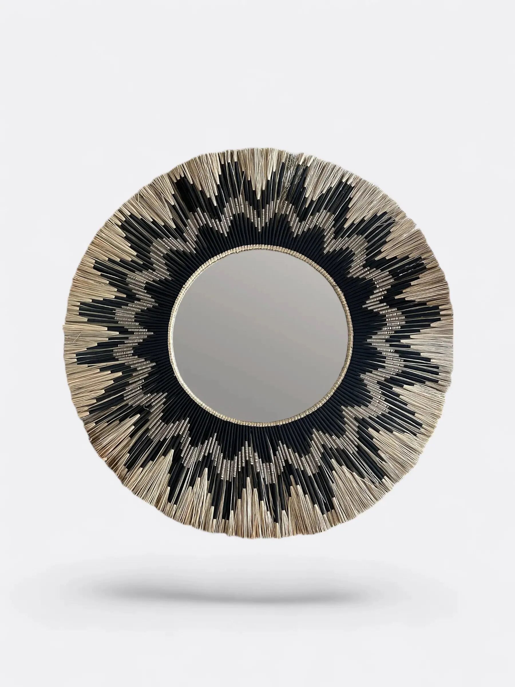Large round handcrafted mirror in reed